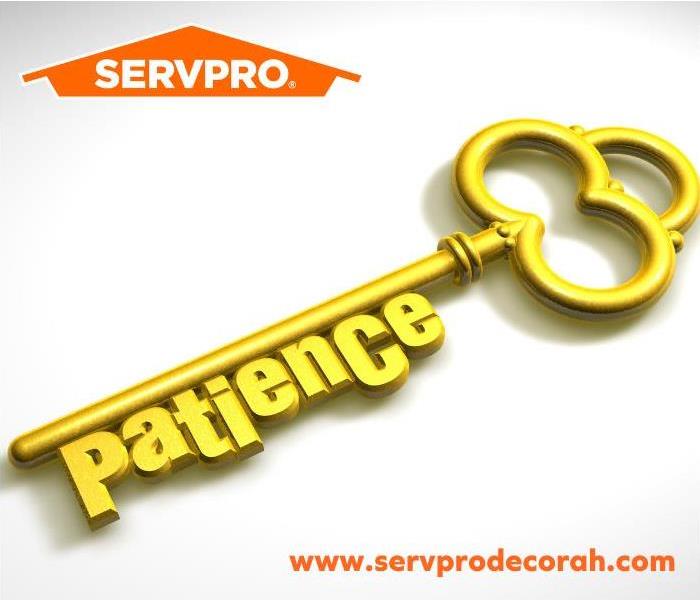 Key that says "patience" with SERVPRO logo and website URL